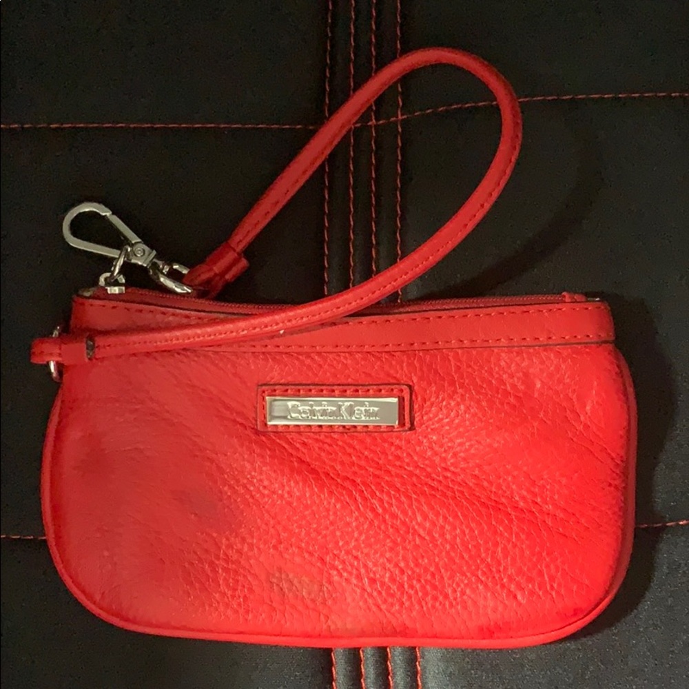 Red Calvin Klein wristlet